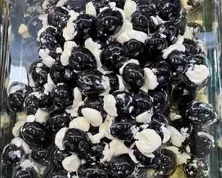 Gordal Negra Rellena de  Queso 100 G.