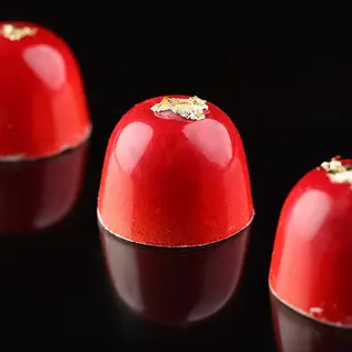ჟოლოს ჩიზქეიქის ბონბონი
