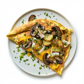 Tortilla Con Champiñones Y Queso Más Cebolla Y Papas