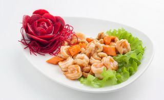 57. Gamberi con anacardi