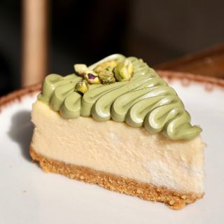 Fatia cheesecake pistachio