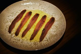 Anchoas Con creyente de pan y orrgano