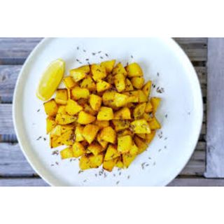 Fried potatoes toasted with cumin seeds