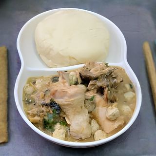 Pounded Yam with Preferred Soup and Chicken