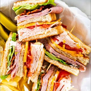 GRILLED HAM,TOMATO,CHEESE SANDWICH (comes with chips,soda,banana)