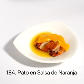 Wok de pato con salsa de naranja
