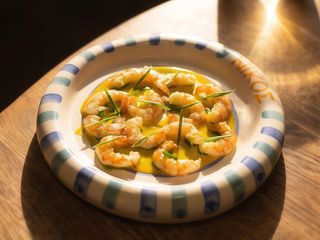 Лангустини  саганакі з соусом лимонакі (110г)