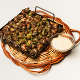 Cargols sofregits a la llauna