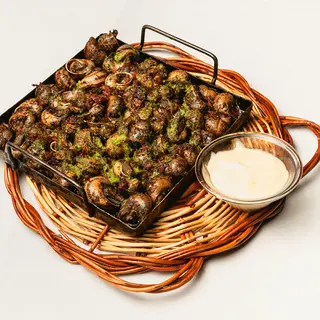 Cargols sofregits a la llauna