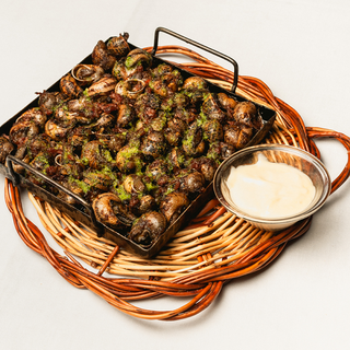 Cargols sofregits a la llauna