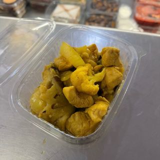 Pollo con cúrcuma (Ración)