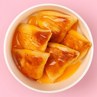 Млинці з заварним кремом в апельсиновому соусі