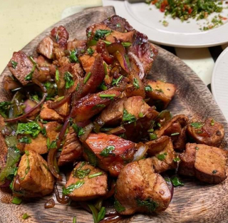 1/2 Kg Dry Pork with Ugali or Chapati and Greens