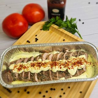 Вирізка свинна су-від під сирним соусом 570 грам