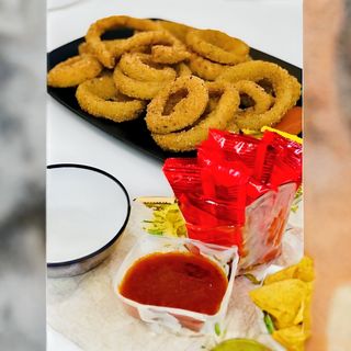 Ración De Aros De Cebolla Rebozadas (6 Uds.)