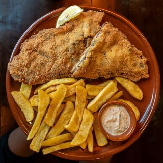 Milanesa Queso De Cabra Y Cebolla Caramelizada