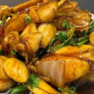 Cosce di rana con zenzero e cipolle 