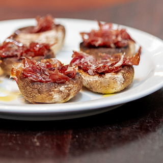 Xampinyons amb pernil de jabugo 