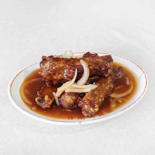 Costillas Con Salsa "Capital"