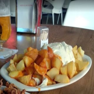 Ración De Patatas Braviolis