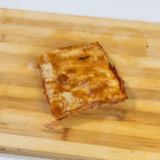 Parigina con pomodoro, prosciutto e mozzarella