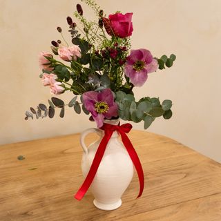 Violetero con flor variada