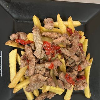 Tiras De Solomillo De Cerdo Con Patatas Y