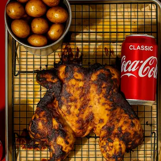 Menú pollo 1 ud. + patatas asadas + bebida 2 uds.