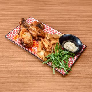 Coscette di pollo con patate fritte