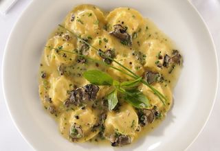 Ravioli al pollo e funghi