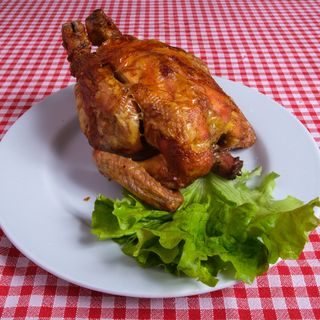 Pollo intero allo spiedo