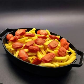 105. Salchipapas gratinados mediano