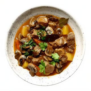 Ternera Con Champiñones