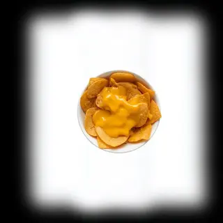 Nachos snack con crema di cheddar piccante