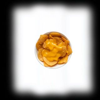 Nachos snack con crema di cheddar piccante