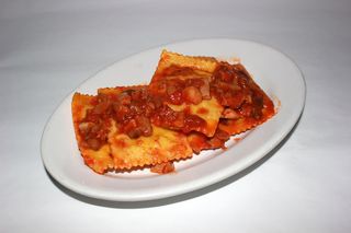 Tortelli con sugo e funghi