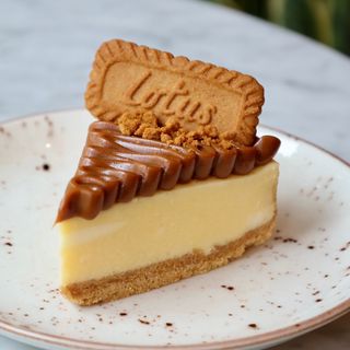 Fatia cheesecake doce de leite