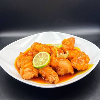 Pollo con jengibre y cebolletas