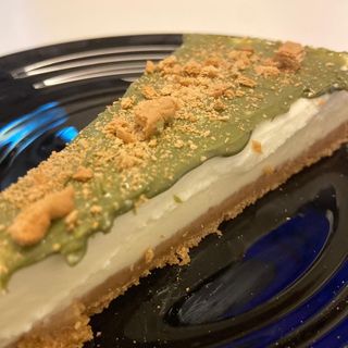 Cheesecake con crema de pistacho