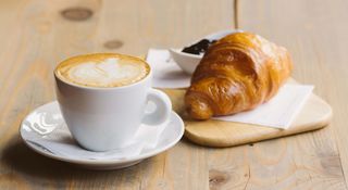 Coffee With Milk + Turkey And Cheese Croissant