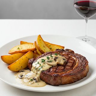 Rib Eye Steak 300g served with Mushroom sauce