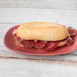 Paleta Ibérica con aceite y tomate mini