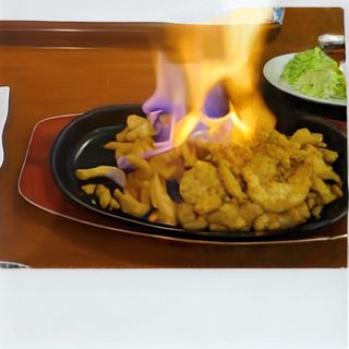 83A. Tie-Pan De Tiritas De Pollo Flambeadas