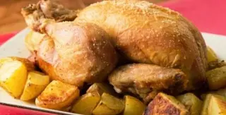 Mezzo pollo allo spiedo con patate a forno