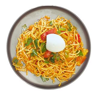 Jollof spaghetti + 1 boiled egg