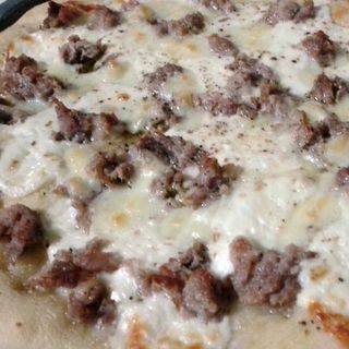 Salsiccia e porcini  1/2 teglia