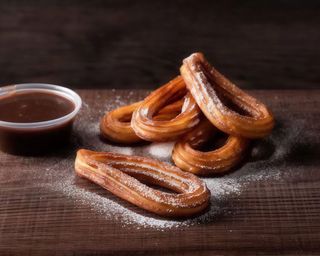 Churros com compota morango