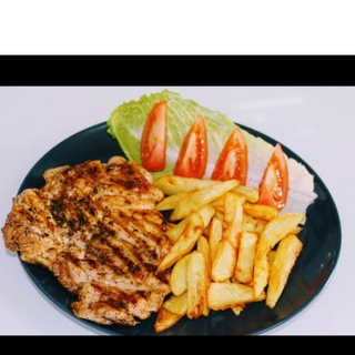 Пилешка бут пържола с картофи 600г