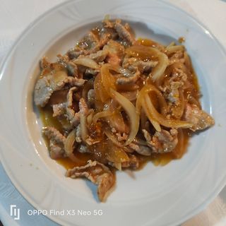 509 Vitello con cipolle