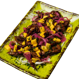 Pato picante y mango (Singapur)